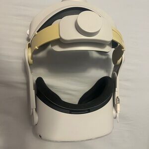 Meta Quest 2 VR Headset with Adjustable Strap and both controllers.